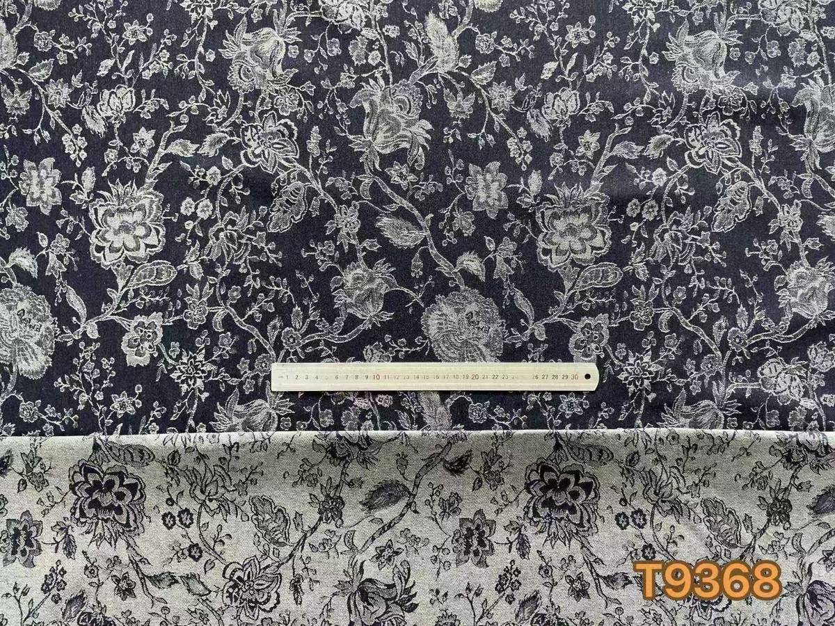 T9368 blue and white floral patterned denim with a ruler for scale